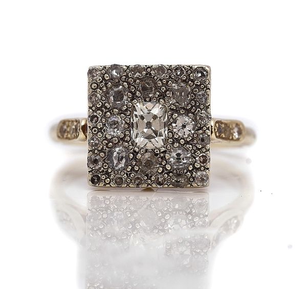 A 9CT WHITE GOLD AND DIAMOND SQUARE CLUSTER RING