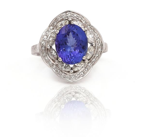 WITHDRAWN A WHITE GOLD, TANZANITE AND DIAMOND CLUSTER RING