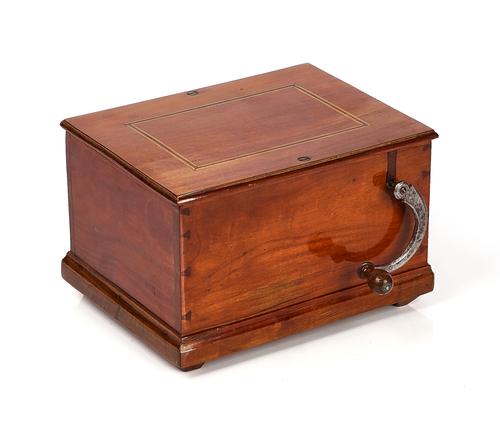 A MAHOGANY CASED TABLE ORGAN / SERINETTE