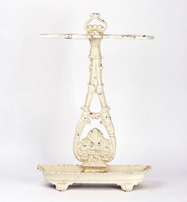 A WHITE PAINTED CAST IRON UMBRELLA STAND