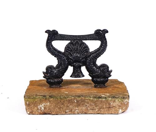A CAST-IRON ‘DOLPHIN’ BOOT-SCRAPER