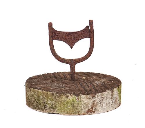 A WROUGHT-IRON STIRRUP SHAPED BOOT-SCRAPER