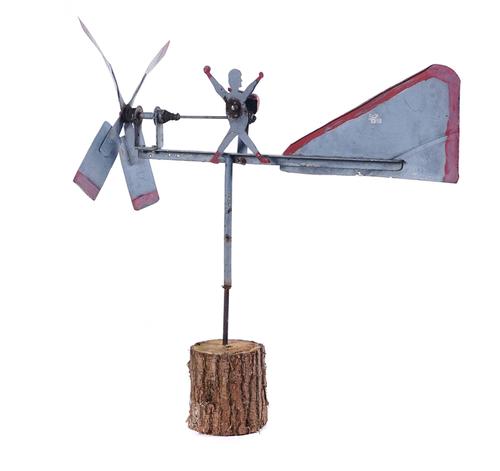 FOLK ART: A GREY AND RED PAINTED METAL WHIRLY GIG