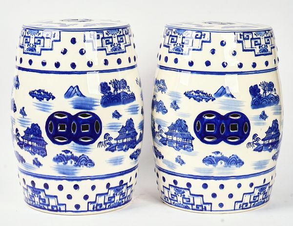 A PAIR OF CHINESE BLUE AND WHITE CERAMIC BARREL SHAPED GARDEN SEATS