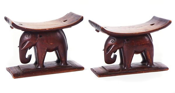 A PAIR OF 20TH CENTURY AFRICAN HARDWOOD STOOLS