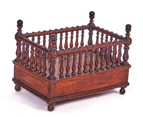 A MID-19TH CENTURY MAHOGANY GALLERIED BOOK STAND