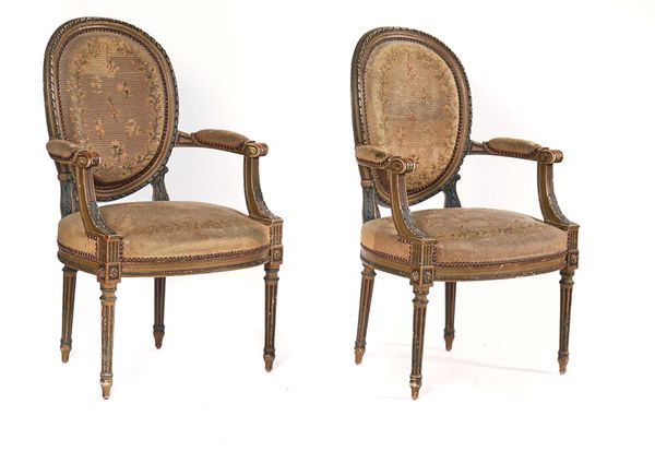 A PAIR OF LOUIS XVI STYLE GREEN PAINTED OPEN ARMCHAIRS (2)