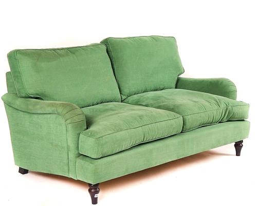 A MODERN GREEN UPHOLSTERED TWO SEAT SOFA