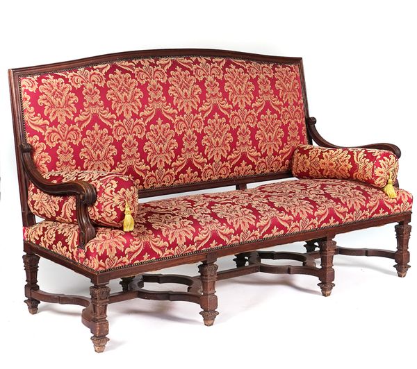 A FRENCH 18TH CENTURY STYLE STAINED BEECH HUMPBACK OPEN ARM SOFA