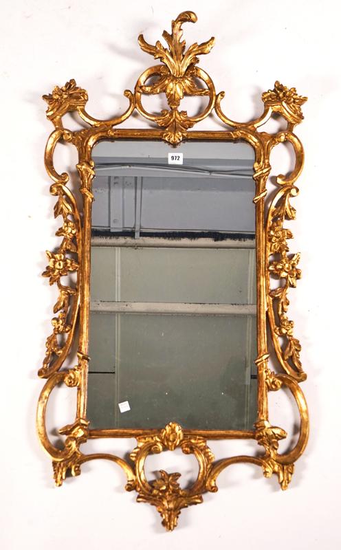 A GEORGE III STYLE GILT FRAMED MIRROR