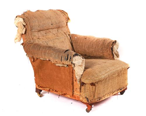 CORNELIUS V SMITH; A VICTORIAN SCROLL BACK EASY ARMCHAIR