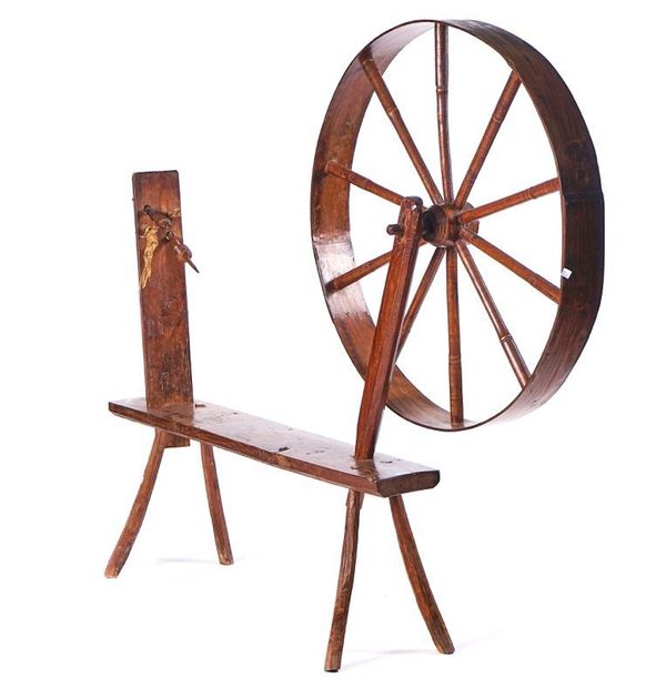 A 19TH CENTURY OAK AND ELM SPINNING WHEEL