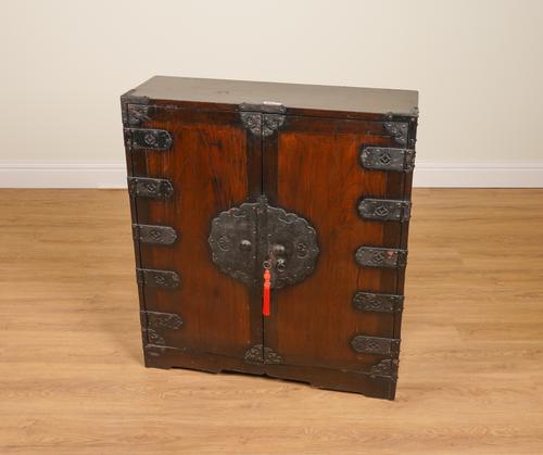 AN EARLY 20TH CENTURY CHINESE-EXPORT METAL BOUND MEDICINE CABINET