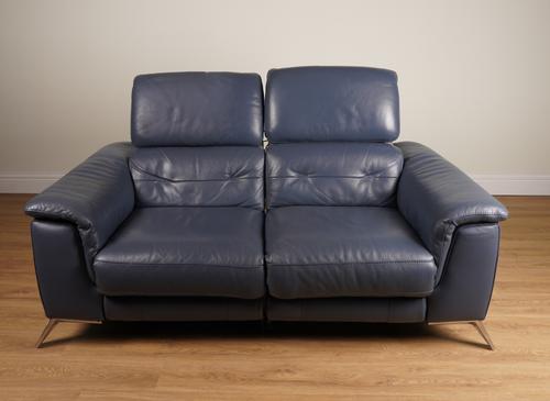HARVEYS; A MODERN BLUE LEATHR RECLINING TWO SEAT SOFA ON CHROME SUPPORTS