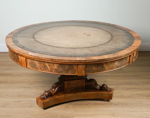 A WILLIAM IV FIGURED MAHOGANY DRUM TOP LIBRARY TABLE