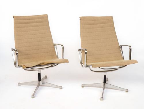 CHARLES AND RAY EAMES FOR MILLER; A PAIR OF EA 116 FLAT BASE EASY CHAIRS (2)