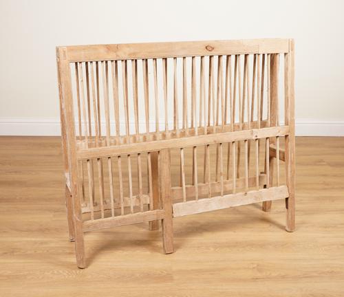 A LARGE COUNTRY HOUSE PINE FLOOR STANDING PINE PLATE RACK