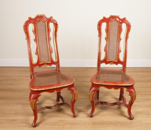 A PAIR PARCEL-GILT RED LACQUER SIDE CHAIRS OF 17TH CENTURY VENETIAN STYLE