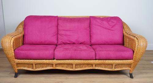 A CANE WORK THREE-SEAT SOFA