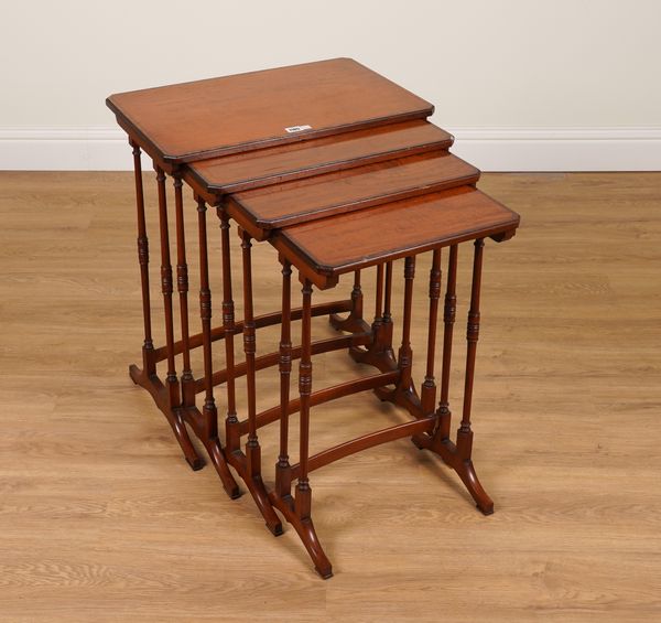 A NEST OF FOUR 19TH CENTURY ROSEWOOD BANDED SATINWOOD OCCASIONAL TABLES