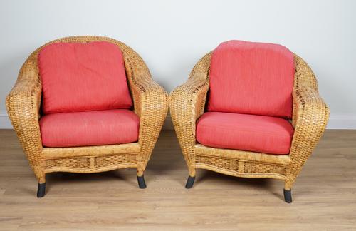 A PAIR OF CANE WORK ARMCHAIRS (2)