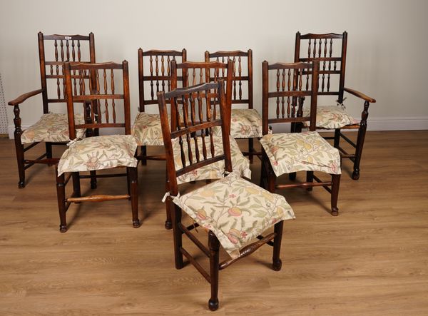 A MATCHED SET OF EIGHT LATE 18TH CENTURY ASH AND BEECH RUSH SEAT BOBBIN BACK DINING CHAIRS (8)