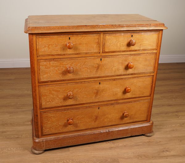 A 19TH CENTURY FIGURED ASH CHEST OF DRAWERS