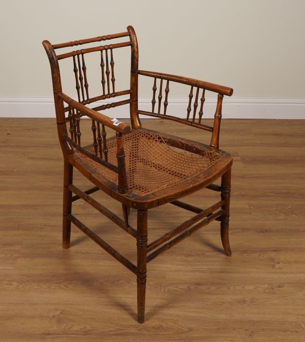 A 19TH CENTURY POLYCHROME PAINTED FAUX BAMBOO OPEN ARMCHAIR