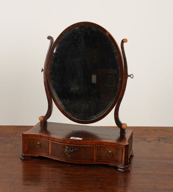 A GEORGE III KINGWOOD BANDED  SERPENTINE TOILET MIRROR