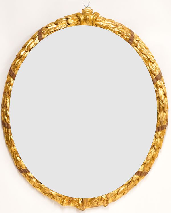 A 19TH CENTURY GILT FRAMED OVAL WALL MIRROR WITH RIBBON TIED ACANTHUS FRAME