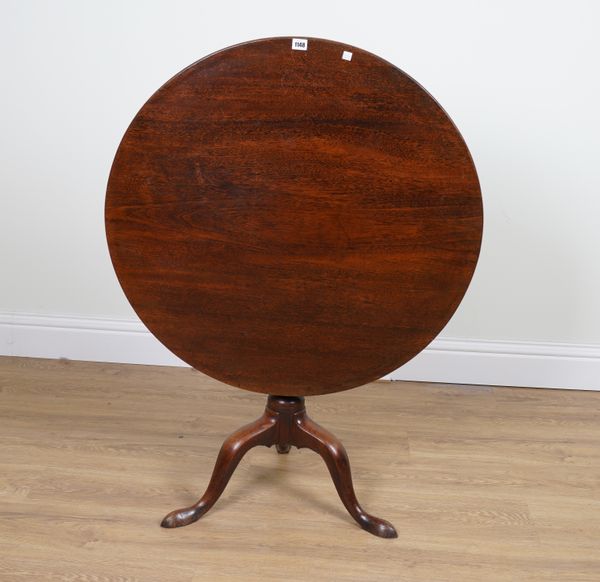 A GEORGE II MAHGANY CIRCULAR SNAP TOP TRIPOD OCCASIONAL TABLE