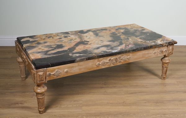 A MARBLE RECTANGULAR COFFEE TABLE ON A CARVED AND POLYCHROME PAINTED BASE