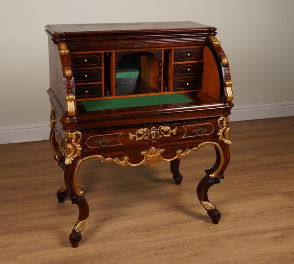 A LATE 19TH CENTURY ITALIAN PARCEL-GILT ROSEWOOD CYLINDER BUREAU