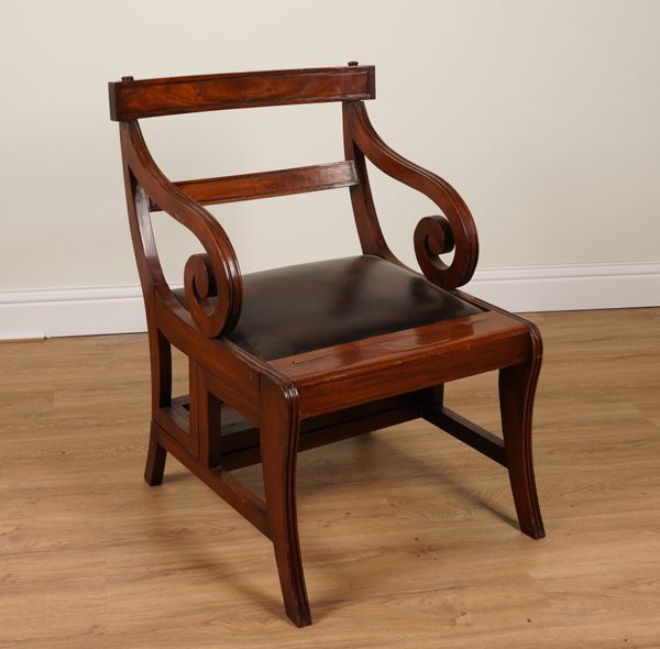 A REGENCY STYLE MAHOGANY SHEPHERD’S CROOK ARM METAMORPHIC  LIBRARY CHAIR