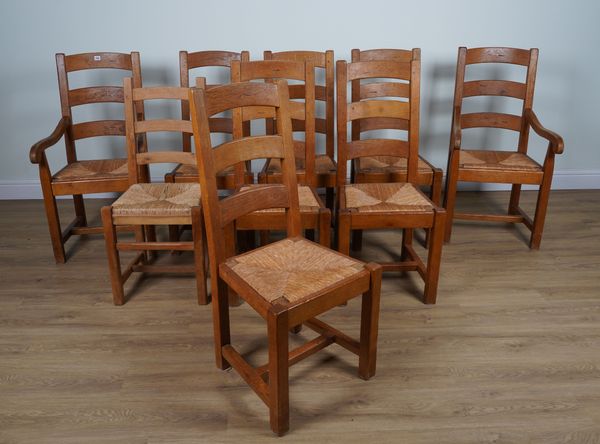 A SET OF SIX OAK FRAMED LADDER BACKED DINING CHAIRS AND TWO SIMILAR (8)