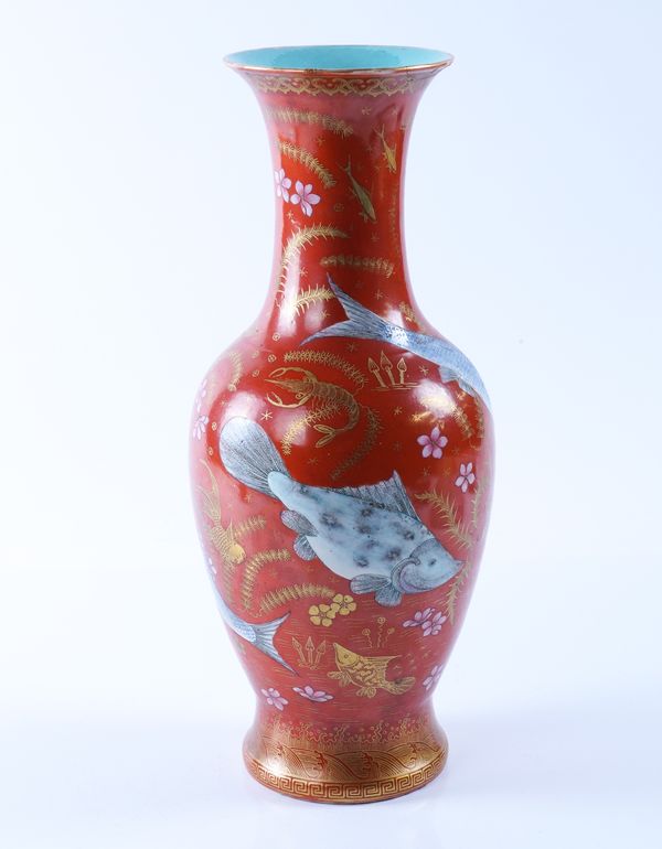 A CHINESE CORAL-GROUND BALUSTER VASE