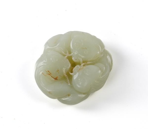 A CHINESE JADE CARVING OF THREE CATFISH