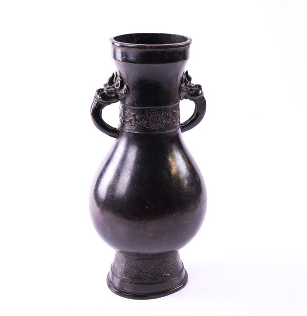 A CHINESE BRONZE VASE (HU)