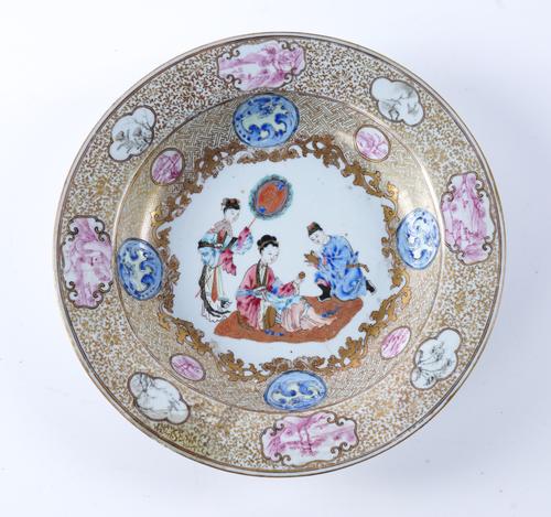 A CHINESE EXPORT FAMILLE-ROSE SOUP PLATE