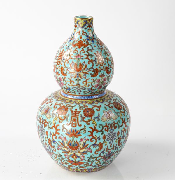 A CHINESE FAMILLE-ROSE TURQUOISE-GROUND DOUBLE GOURD VASE