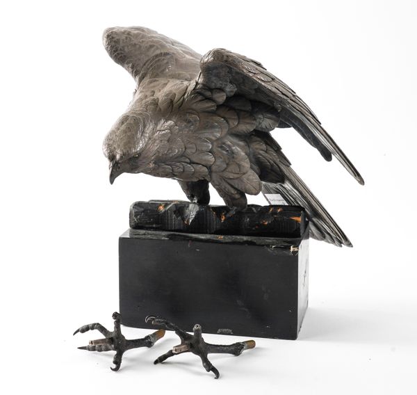 A JAPANESE SILVERED BRONZE MODEL OF A HAWK