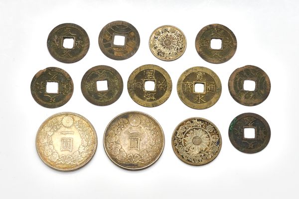 A GROUP OF JAPANESE COINS (13)