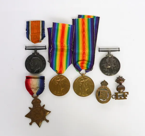 A GROUP OF THREE FIRST WORLD WAR MEDALS, TWO FURTHER MEDALS AND TWO BADGES  (7)