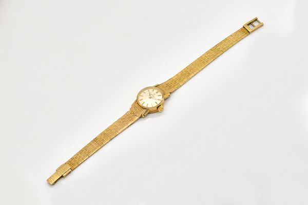 AN OMEGA LADY'S GOLD  BRACELET WRISTWATCH