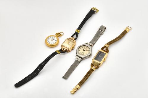 A LADIES 9CT GOLD TUDOR COCKTAIL WATCH (4)