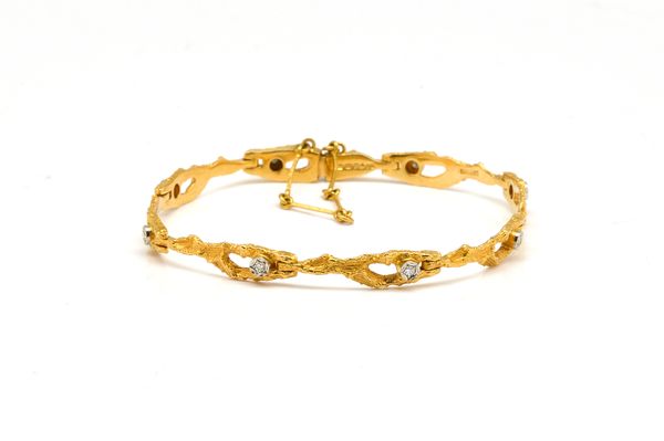 A GOLD AND DIAMOND BRACELET