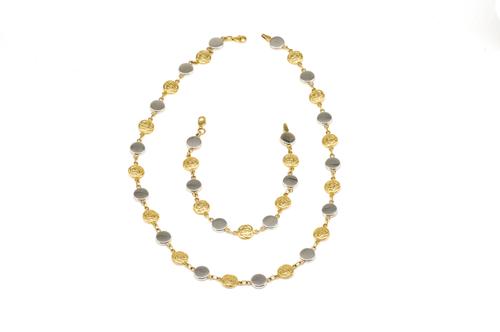 A 10 CT GOLD CELTIC DESIGN NECKLACE AND A MATCHING BRACELET