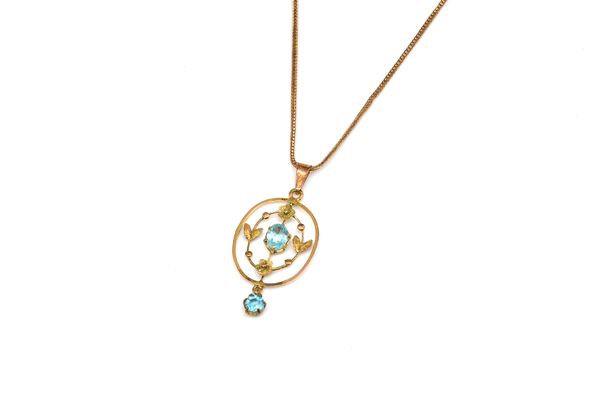 A GOLD AND PALE BLUE GEM SET PENDANT WITH A 9CT GOLD NECKCHAIN (2)