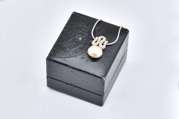 A VERSACE WHITE GOLD, DIAMOND AND MABE PEARL PENDANT