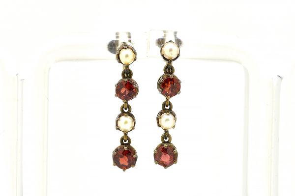 A PAIR OF GARNET AND CULTURED PEARL EARRINGS